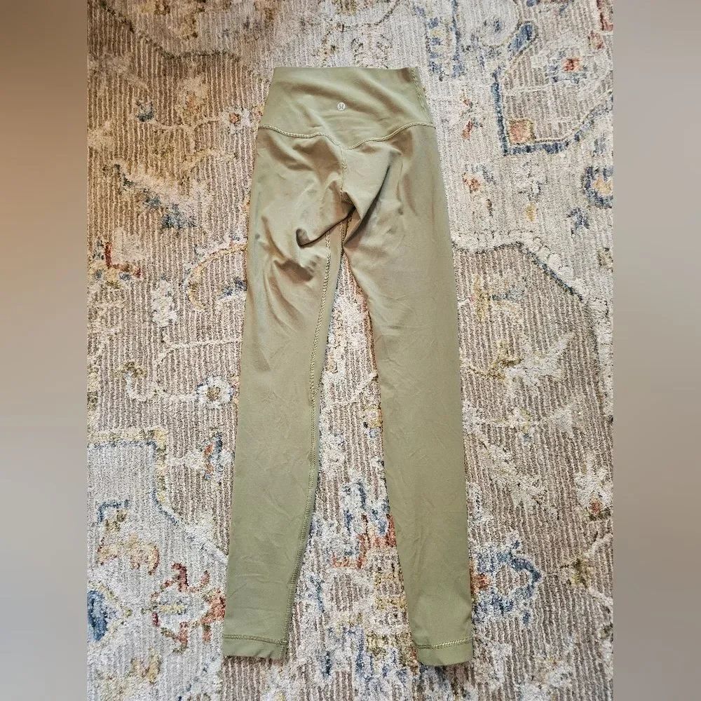 Lululemon olive green leggings size 2 great condition with 30 in inseam